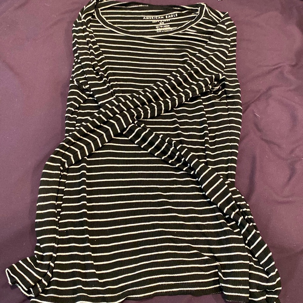 Cute winter top! The black and white pattern brings out the complexion